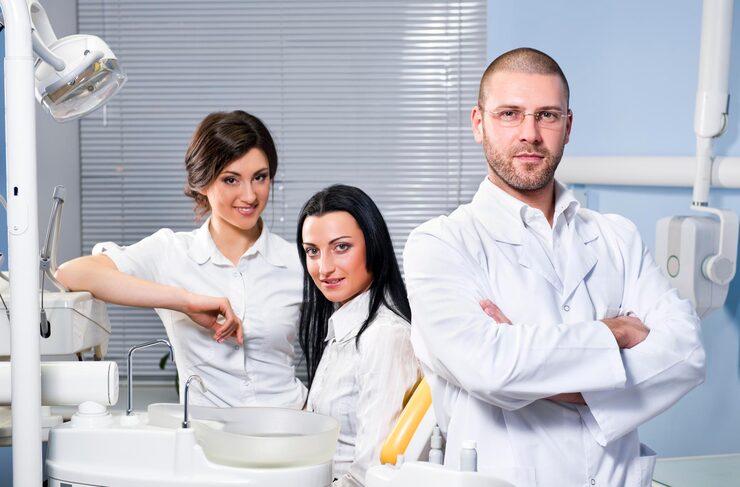 portrait-confident-doctors-with-patient-dental-clinic_1048944-30864354